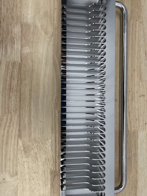 A multi-blade stainless steel assembly machined at RG Manufacturing